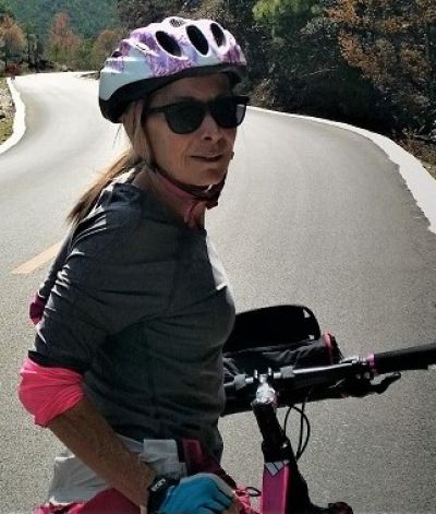 Marie Clune Cycling on the  tour with redspokes